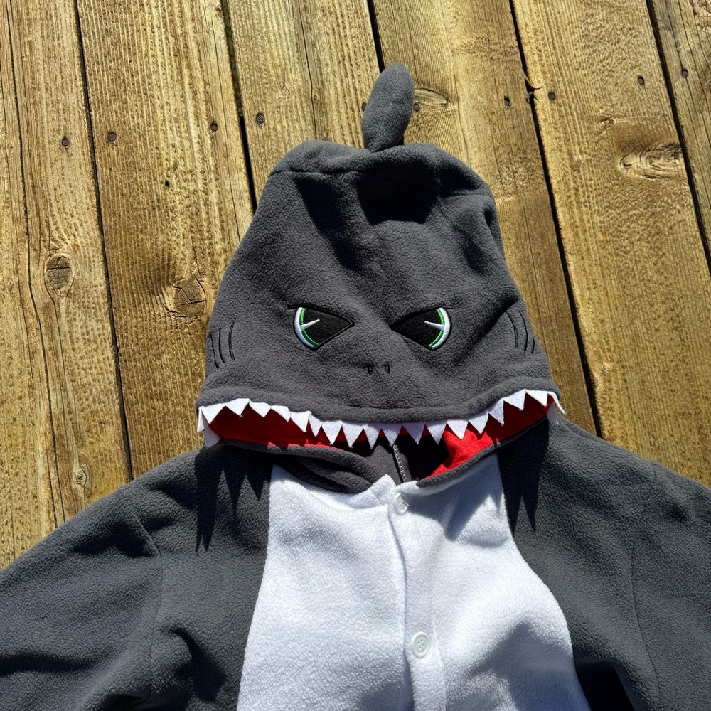 Shark costume or pajamas fleece size medium.